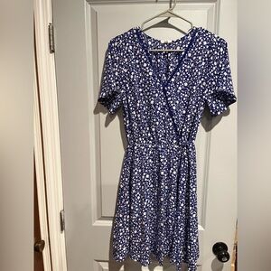 White and blue flow dress. Has a tie to cuten it up a bit.